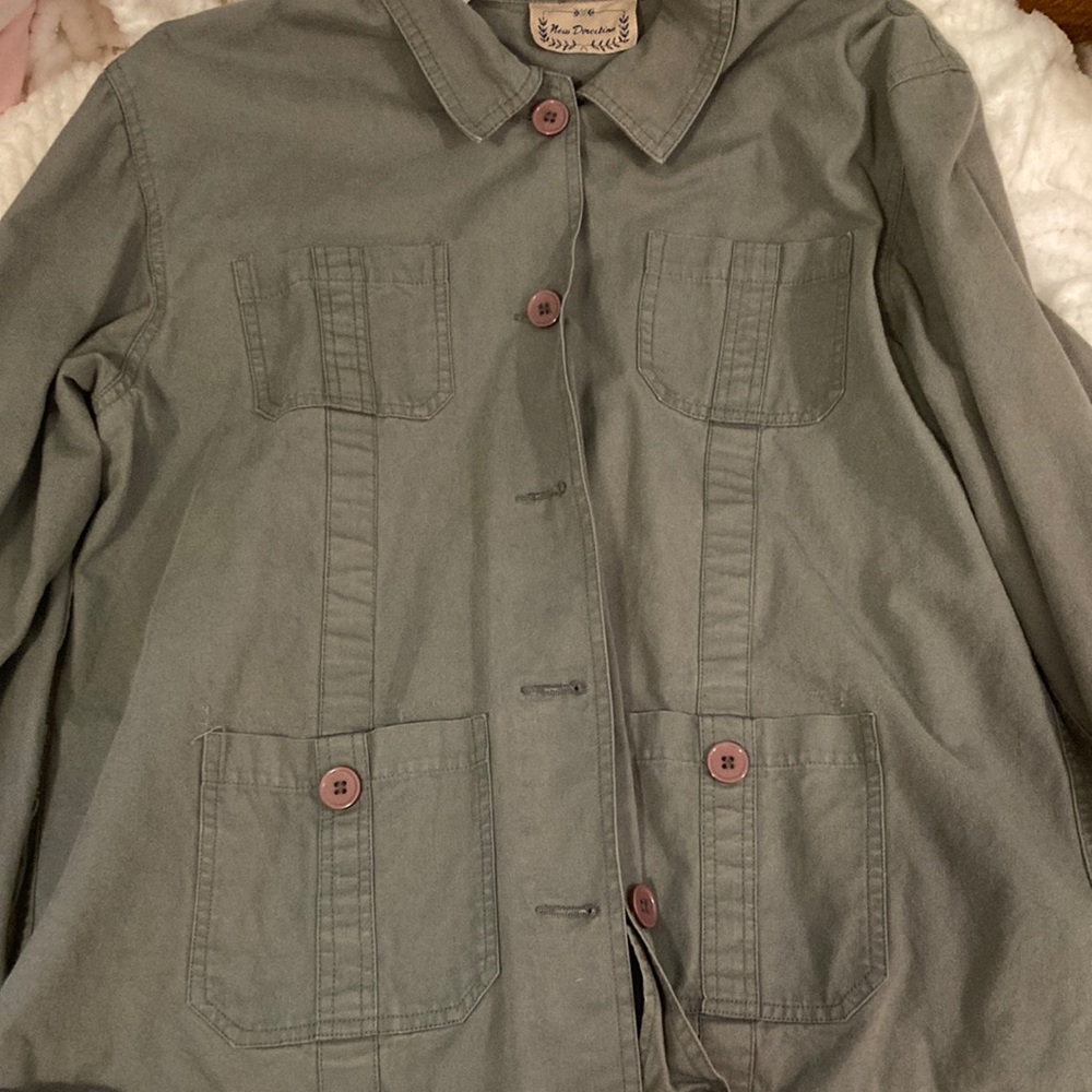 This is a green camo colored jacket.